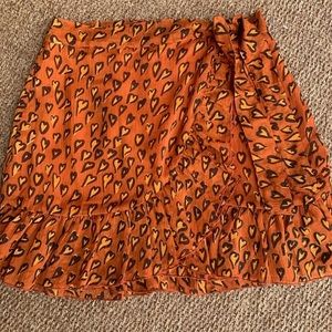 urban outfitters burnt orange ruffle skirt